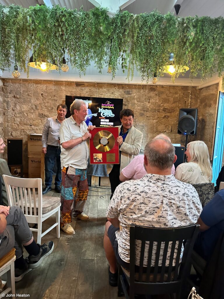 Chris received the gold disk for Seasons